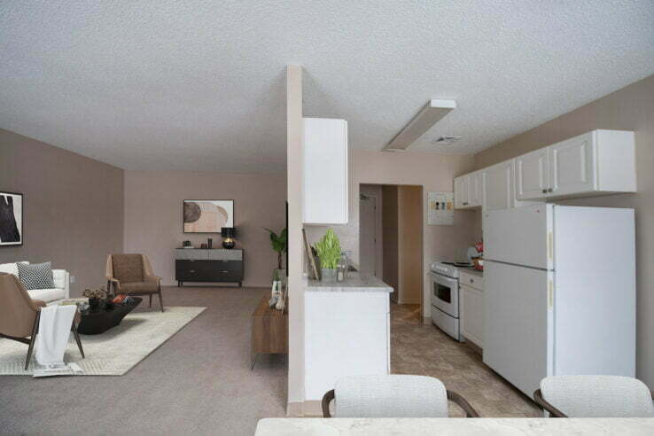 living area, dining area, bedroom in a 1 bedroom unit at Gateway Apartments in Winnipeg, Manitoba